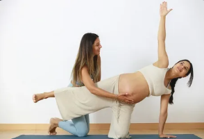 Expectant mothers in a calming yoga support session